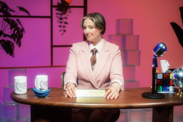 Katie at the host desk